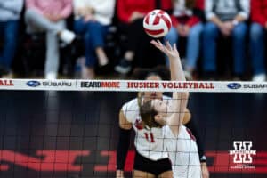 Nebraska Cornhusker setter Bergen Reilly (2) sets the ball against the Illinois Fighting Illini in the third set during a college volleyball match on Thursday, November 6, 2025, in Lincoln, Nebraska. Photo by John S. Peterson.