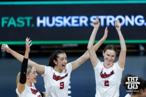 Nebraska Cornhusker opposite Virginia Adriano (9) and setter Bergen Reilly (2) celebrate a kill in the second set against the Illinois Fighting Illini during a college volleyball match on Thursday, November 6, 2025, in Lincoln, Nebraska. Photo by John S. Peterson.
