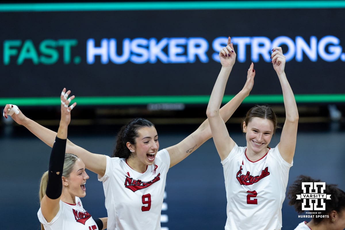 Nebraska Cornhusker opposite Virginia Adriano (9) and setter Bergen Reilly (2) celebrate a kill in the second set against the Illinois Fighting Illini during a college volleyball match on Thursday, November 6, 2025, in Lincoln, Nebraska. Photo by John S. Peterson.