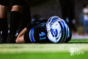Creighton Preps Vincent Constantino (41) is laying down and getting ready for the second half of a high school football game against Lincoln Southeast on Friday, October 31, 2025 in Omaha, Nebraska. Photo By Jack Stephens.