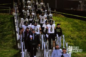 Lincoln Southeast walking out as a team before a high school football game at Creighton Prep on Friday, October 31, 2025 in Omaha, Nebraska. Photo By Jack Stephens.