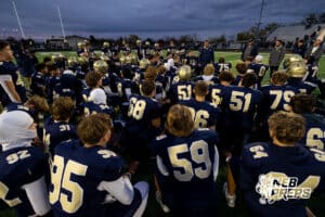 Elkhorn South coach talks to his team after a win over Millard West during a high school football game on Friday, October 31, 2025, in Omaha, Nebraska. Photo by Braden Cochran.