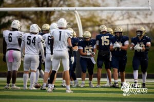 Elkhorn South breaks the huddle for the next play against Millard West during a high school football game, Friday, October 31, 2025, Omaha, Nebraska. Photo by Braden Cochran.