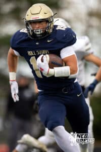 Elkhorn South Jaydon Sutko (19) runs with the ball during a high school football game, Friday, October 31, 2025, Omaha, Nebraska. Photo by Braden Cochran.