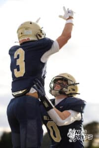 Elkhorn South receiver Bennet Gillman (3) is lifted into the air by Griffin McDonald (0) after a touchdown during a high school football game, Friday, October 31, 2025, Omaha, Nebraska. Photo by Braden Cochran.