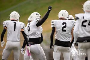 Millard West defensive tackle Ethan Amenyah (6) celebrates with his teammates after a 3rd down stop during a high school football game, Friday, October 31, 2025, Omaha, Nebraska. Photo by Braden Cochran.