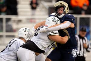 Elkhorn South defensive lineman Cooper Perrien is stuffed by a punt team member from Millard West during a high school football game, Friday, October 31, 2025, Omaha, Nebraska. Photo by Braden Cochran.
