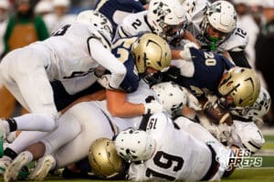 Elkhorn South running back Joey Kiscoan (20) is brought down and loses the ball during a high school football game, Friday, October 31, 2025, Omaha, Nebraska. Photo by Braden Cochran.