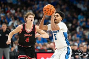 Creighton Bluejay Nik Graves (#5) shoots a three during a basketball game against South Dakota on Wednesday, November 5, 2025, in Omaha, Nebraska. Photo by Brandon Tiedemann.