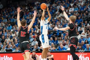 Creighton Bluejay Austin Swartz (#1) shoots between defenders during a basketball game against South Dakota on Wednesday, November 5, 2025, in Omaha, Nebraska. Photo by Brandon Tiedemann.