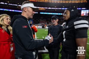 Nebraska Cornhusker defensive back Ceyair Wright (1) shakes hands with Southern California Trojan head coach Lincoln Riley after the a college football game on Saturday, November 1, 2025, in Lincoln, Nebraska. Photo by John S. Peterson.