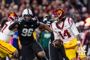 Nebraska Cornhusker defensive lineman Williams Nwaneri (96) pursues Southern California Trojan quarterback Jayden Maiava (14) in the first quarter during a college football game on Saturday, November 1, 2025, in Lincoln, Nebraska. Photo by John S. Peterson.