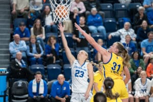 Creighton Bluejay Neleigh Gessert (#23) shoots a contested layup during a basketball game against South Dakota State on Monday, November 3, 2025, in Omaha, Nebraska. Photo by Brandon Tiedemann.