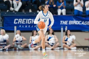Creighton Bluejay Kiani Lockett (#11) takes the ball up court during a basketball game against South Dakota State on Monday, November 3, 2025, in Omaha, Nebraska. Photo by Brandon Tiedemann.