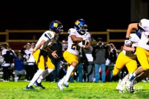 Wahoo's Micah Hardy (20) is running the ball during a high school football game at Concordia on Friday, October 24, 2025 in Omaha, Nebraska. Photo By Jack Stephens.
