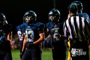 Concordia's Ryder Harrington (33) and Drew Kulus (4) are celebrating after scoring a touchdown during a high school football game against Wahoo on Friday, October 24, 2025 in Omaha, Nebraska. Photo By Jack Stephens.