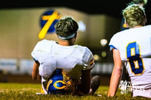 Wahoo's Jase Kaminski (4) is relaxing during halftime of a high school football game at Concordia on Friday, October 24, 2025 in Omaha, Nebraska. Photo By Jack Stephens.