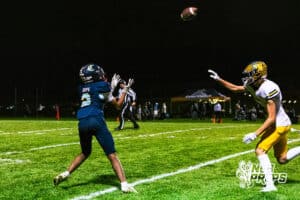 Concordia's Tanner David (2) is catching a deep ball for a huge gain in yards during a high school football game against Wahoo on Friday, October 24, 2025 in Omaha, Nebraska. Photo By Jack Stephens.