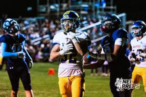 Wahoo's Kip Brigham (32) is running into the end zone to score a rushing touchdown during a high school football game at Concordia on Friday, October 24, 2025 in Omaha, Nebraska. Photo By Jack Stephens.