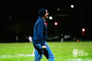 Concordia's Head Coach Adolph Shepardson is yelling at his team during a high school football game against Wahoo on Friday, October 24, 2025 in Omaha, Nebraska. Photo By Jack Stephens.