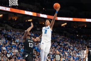 Creighton Bluejay Blake Harper (2) shoots over Drayton Jones (13) during a basketball game against Butler on Tuesday, Dec 30, 2025, in Omaha, Nebraska. Photo by Brandon Tiedemann.