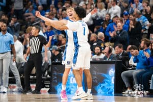 Creighton Bluejays Ty Davis (9) and Austin Swartz (1) celebrate after a Butler timeout during a basketball game against Butler on Tuesday, Dec 30, 2025, in Omaha, Nebraska. Photo by Brandon Tiedemann.
