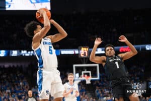 Creighton Bluejay Nik Graves (5) shoots a three pointer during a basketball game against Butler on Tuesday, Dec 30, 2025, in Omaha, Nebraska. Photo by Brandon Tiedemann.