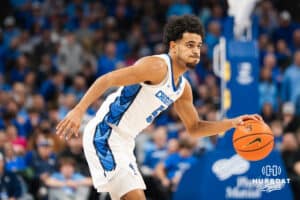 Creighton Bluejay Nik Graves (5) looks for an open teammate during a basketball game against Butler on Tuesday, Dec 30, 2025, in Omaha, Nebraska. Photo by Brandon Tiedemann.