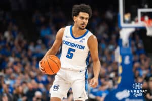 Creighton Bluejay Nik Graves (5) dribbles the ball up the court during a basketball game against Butler on Tuesday, Dec 30, 2025, in Omaha, Nebraska. Photo by Brandon Tiedemann.