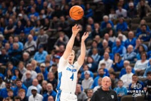Creighton Bluejay Josh Dix (4) shoots a wide open three pointer during a basketball game against Butler on Tuesday, Dec 30, 2025, in Omaha, Nebraska. Photo by Brandon Tiedemann.