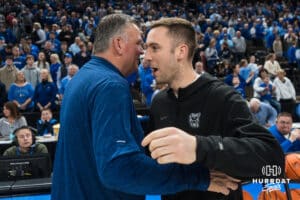 Creighton Bluejay head coach Greg McDermott meets up with Butler coach Connor McCaffery during a basketball game against Butler on Tuesday, Dec 30, 2025, in Omaha, Nebraska. Photo by Brandon Tiedemann.