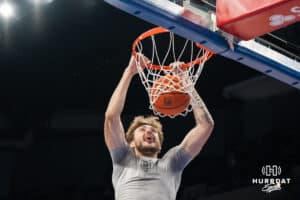 Creighton Bluejay Owen Freeman (32) dunks in warmups before a basketball game against Butler on Tuesday, Dec 30, 2025, in Omaha, Nebraska. Photo by Brandon Tiedemann.