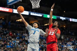 Creighton Bluejay Austin Swartz (1) shoots a contested layup during a basketball game against Utah Tech on Monday, Dec 22, 2025, in Omaha, Nebraska. Photo by Brandon Tiedemann.