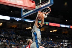 Creighton Bluejay Jasen Green (0) dunks during a basketball game against Utah Tech on Monday, Dec 22, 2025, in Omaha, Nebraska. Photo by Brandon Tiedemann.