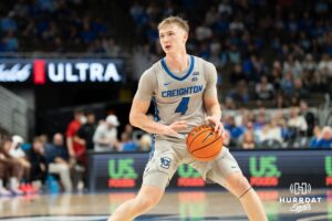 Creighton Bluejay Josh Dix (4) steps back to shoot during a basketball game against Utah Tech on Monday, Dec 22, 2025, in Omaha, Nebraska. Photo by Brandon Tiedemann.