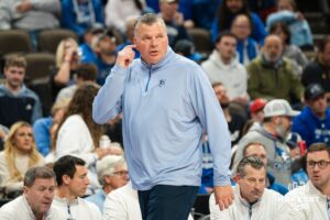 Creighton Bluejay head coach Greg McDermott calls out a baseline out of bounds play during a basketball game against Utah Tech on Monday, Dec 22, 2025, in Omaha, Nebraska. Photo by Brandon Tiedemann.