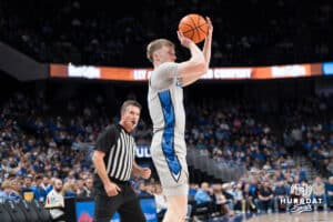 Creighton Bluejay Josh Dix (4) shoots a wide open three pointer during a basketball game against Utah Tech on Monday, Dec 22, 2025, in Omaha, Nebraska. Photo by Brandon Tiedemann.