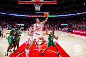 Nebraska Cornhusker forward Pryce Sandfort (21) makes a lay up against the North Dakota Fighting Hawks in the second half during a college basketball game on Sunday, Dec. 21, 2025, in Lincoln, Nebraska. Photo by John S. Peterson.