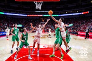 Nebraska Cornhusker forward Berke Büyüktuncel (9) tips the ball away from the basket against the North Dakota Fighting Hawks in the second half during a college basketball game on Sunday, Dec. 21, 2025, in Lincoln, Nebraska. Photo by John S. Peterson.