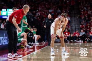 Nebraska Cornhusker guard Sam Hoiberg (1) listening to assistant coach Nate Loenser during a college basketball game against the North Dakota Fighting Hawks on Sunday, Dec. 21, 2025, in Lincoln, Nebraska. Photo by John S. Peterson.
