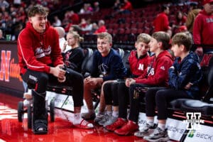 Nebraska Cornhusker guard Connor Essegian talks to some kids during warm ups before a college basketball game against the North Dakota Fighting Hawks on Sunday, Dec. 21, 2025, in Lincoln, Nebraska. Photo by John S. Peterson.