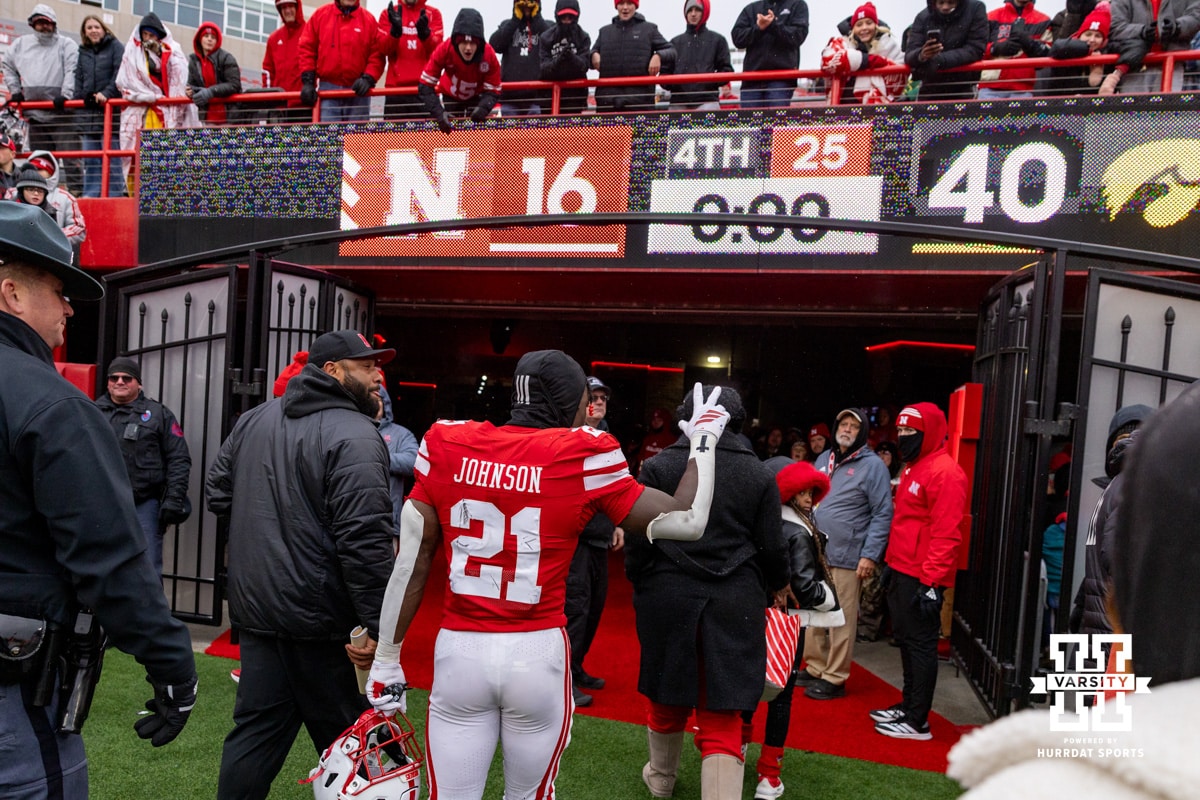 Nebraska Cornhusker running back Emmett Johnson (21) waves to the fans as he walks to the locker room after the loss to the Iowa Hawkeyes during a college football game on Friday, Nov. 28, 2025, in Lincoln, Nebraska. Photo by John S. Peterson.