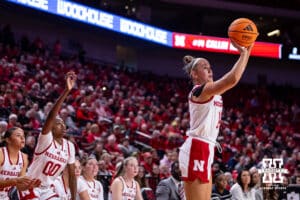 Nebraska Cornhusker guard Callin Hake (14) makes a three point shot against the California Baptist Lancers in the third quarter during a college basketball game on Sunday, Dec. 21, 2025, in Lincoln, Nebraska. Photo by John S. Peterson.