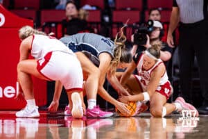 Nebraska Cornhusker guard Callin Hake (14) and California Baptist Lancer forward Emma Johansson (14) go afte the ball in the second quarter during a college basketball game on Sunday, Dec. 21, 2025, in Lincoln, Nebraska. Photo by John S. Peterson.