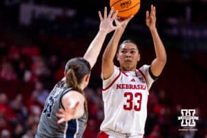 Nebraska Cornhusker forward Amiah Hargrove (33) makes a basket against California Baptist Lancer forward Grace Schmidt (33) in second quarter during a college basketball game on Sunday, Dec. 21, 2025, in Lincoln, Nebraska. Photo by John S. Peterson.
