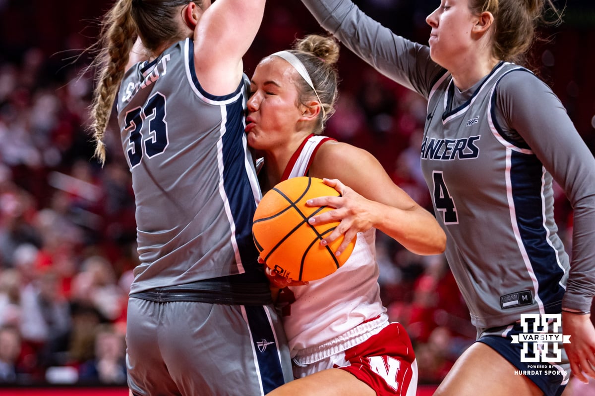 Nebraska Cornhusker guard Callin Hake (14) run into California Baptist Lancer forward Grace Schmidt (33) in the first quarter during a college basketball game on Sunday, Dec. 21, 2025, in Lincoln, Nebraska. Photo by John S. Peterson.