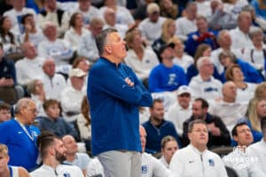 Creighton head coach Greg McDermott watches the big screen. Creighton men's basketball hosts Marquette at CHI Health Center on Saturday, Dec 20, 2025, in Omaha, Nebraska. Photo by Kyle Byers.