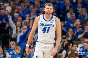 Creighton's Isaac Traudt walks away from the basket after a bucket and a foul. Creighton men's basketball hosts Marquette at CHI Health Center on Saturday, Dec 20, 2025, in Omaha, Nebraska. Photo by Kyle Byers.