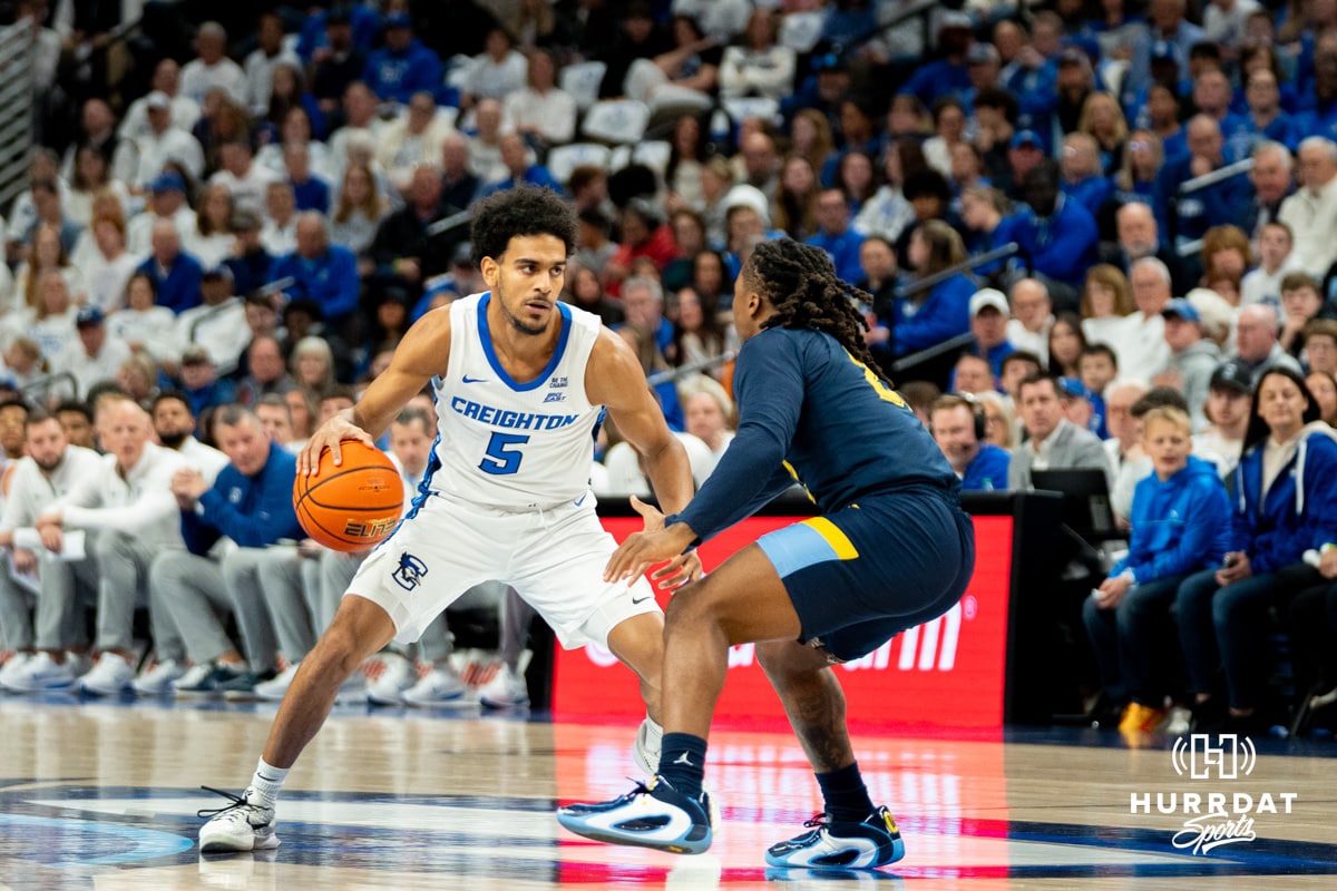 Creighton's Nik Graves dribbles the ball. Creighton men's basketball hosts Marquette at CHI Health Center on Saturday, Dec 20, 2025, in Omaha, Nebraska. Photo by Kyle Byers.
