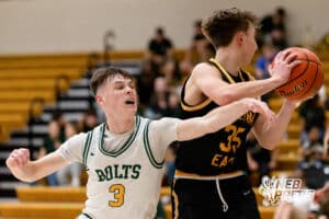 Lincoln Pius X Thundferbolt Charlier Morrow (3) tries to snatch the ball from Connor Levinson (35) during a high school basketball game Thursday, December 11, 2025, in Lincoln, Nebraska. Photo by Braden Cochran.